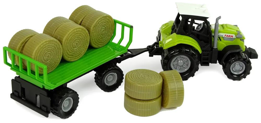 LEAN TOYS Zelený traktor s prívesom so senom
