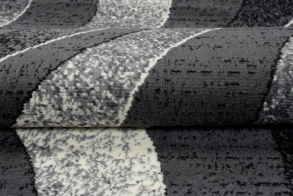 TA Koberec K857A TMAVO SIVÁ LACNÁ PP CRM Rozmer: 70x200 cm