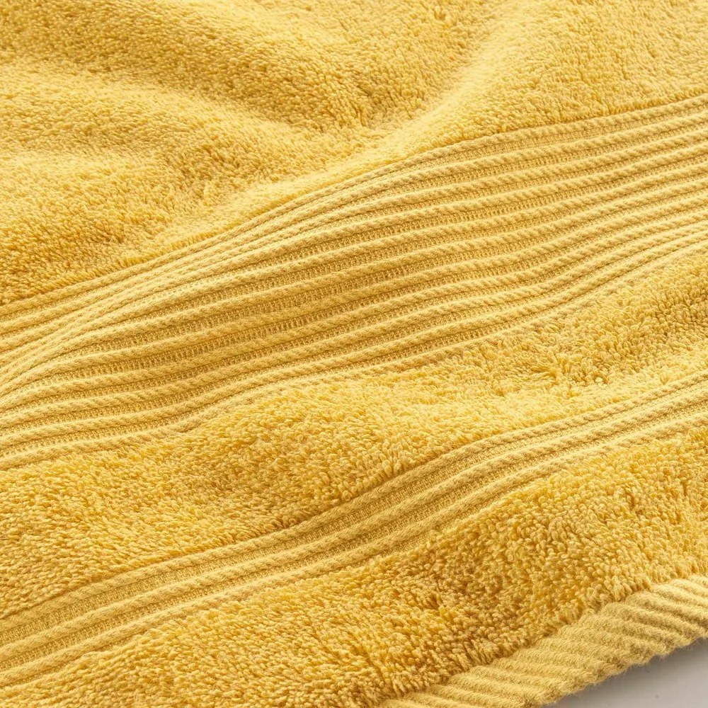 Žltá froté bavlnená osuška 90x150 cm Tendresse – douceur d'intérieur