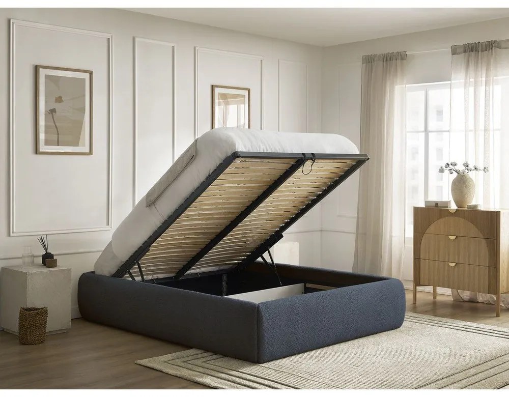 Tmavomodrá čalúnená dvojlôžková posteľ s úložným priestorom/bez čela s roštom 180x200 cm Inera – Bobochic Paris