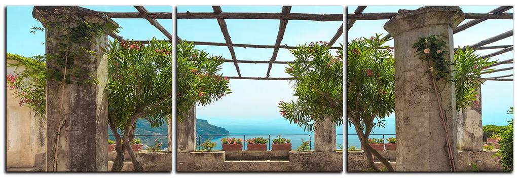 Obraz na plátne - Staroveká záhrada na morskom pobreží - panoráma 5249B (150x50 cm)