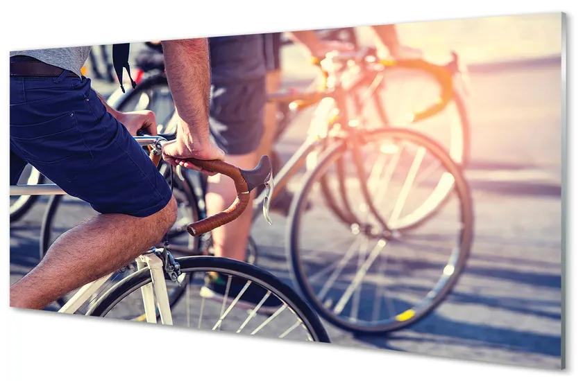 Obraz plexi Cyklisti ľudí 125x50 cm