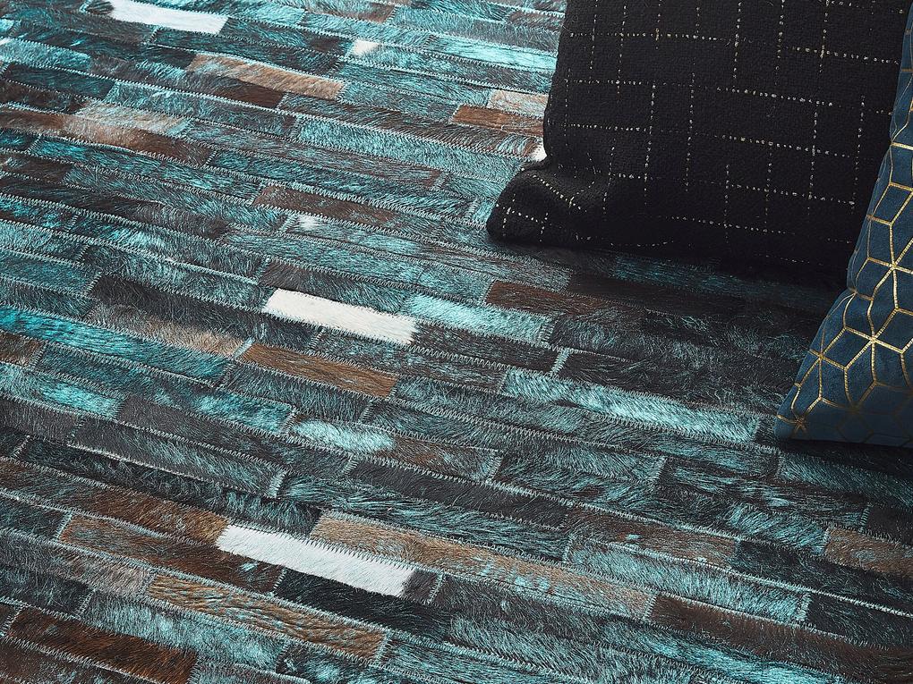 Kožený koberec 160 x 230 cm hnedá/modrá KISIR Beliani