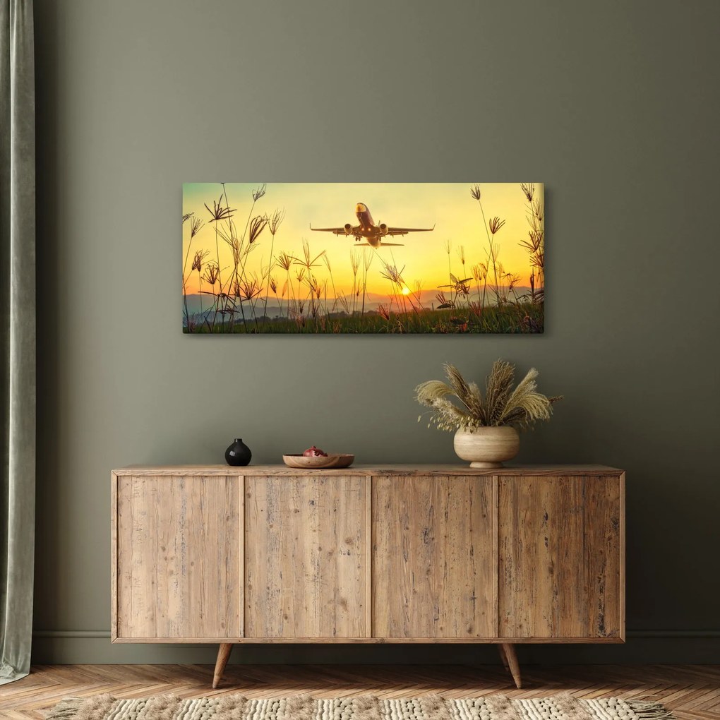 Obraz vzlietajúceho lietadla (120x50 cm)