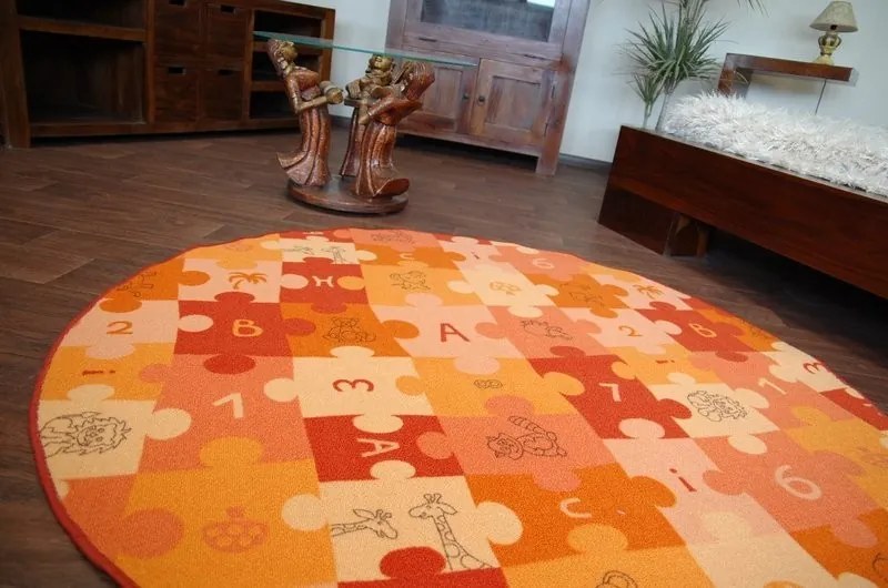 Detský guľatý koberec PUZZLE oranžový
