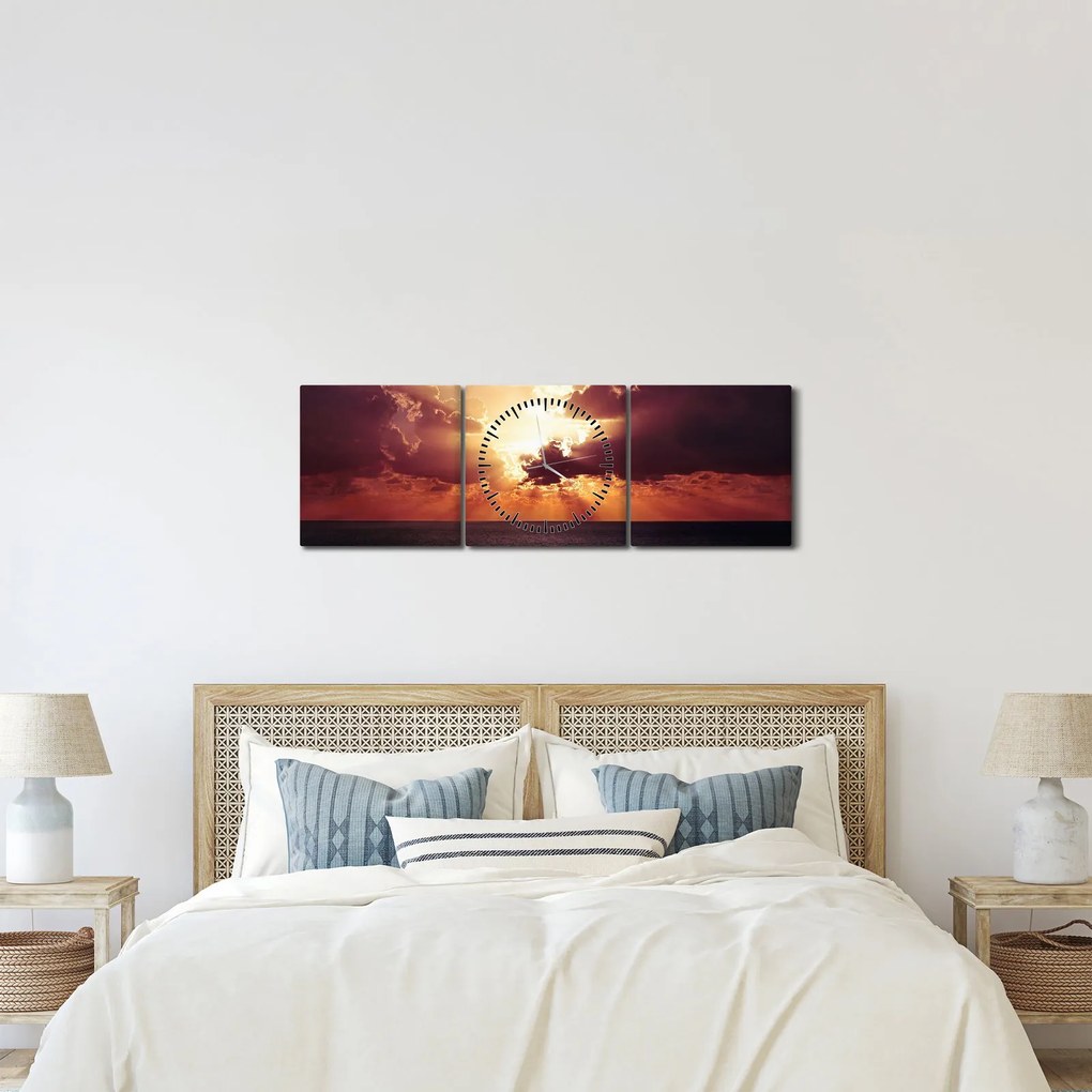 Obraz slnko za mrakmi (s hodinami) (90x30 cm)