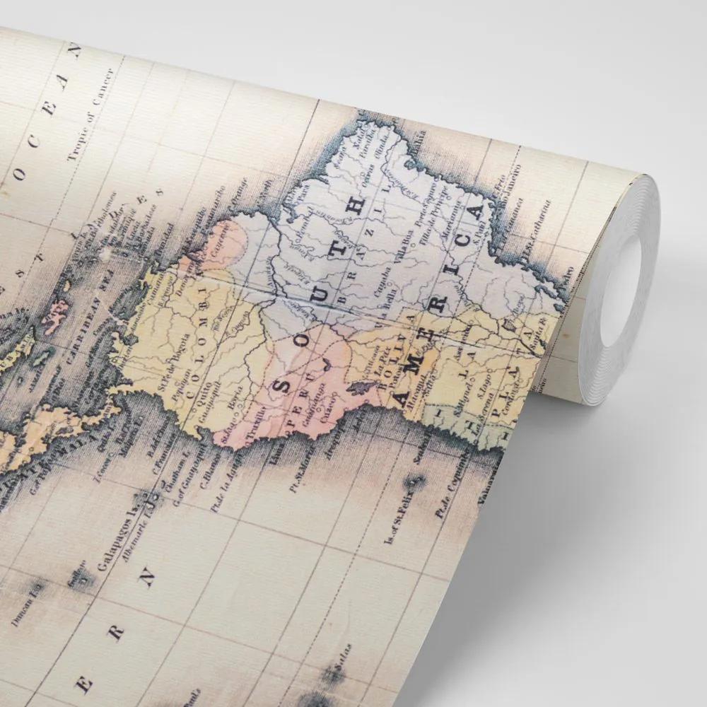 Tapeta lupa na starej mape sveta