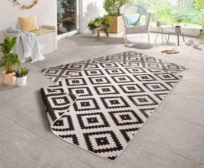 Obojstranný koberec Hanse Home Twin Malta čierny / krémový