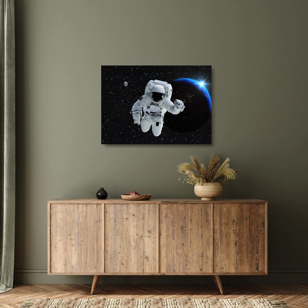 Sklenený obraz - Astronaut vo vesmíre (70x50 cm)