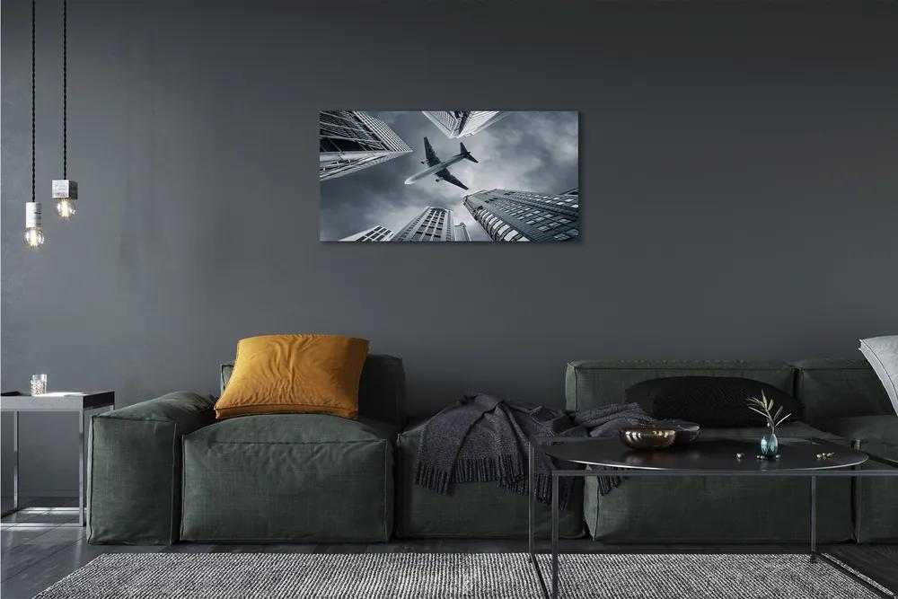 Obraz canvas Veľkomesto oblačnosti letún neba 120x60 cm