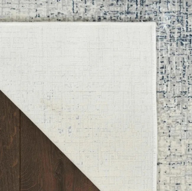 Koberec DKNY Grand Street GRN03 slonia kosť / modrý