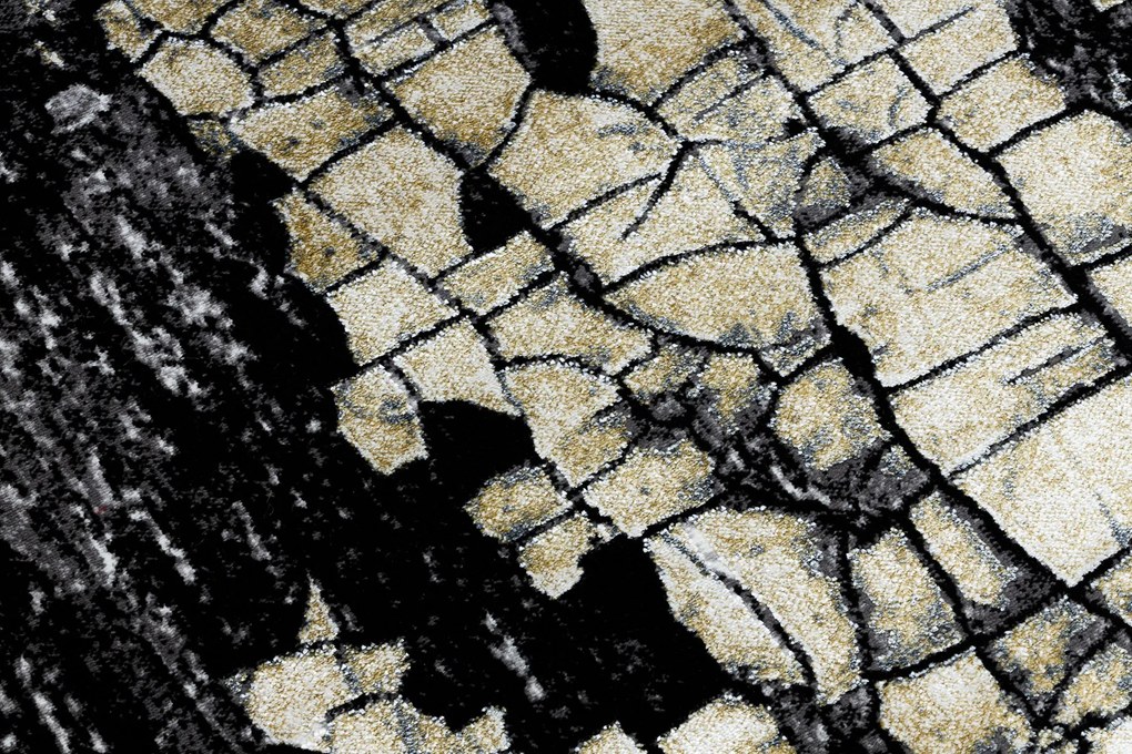 Moderný koberec DE LUXE 2079 Štrukturálny zlatý / sivý