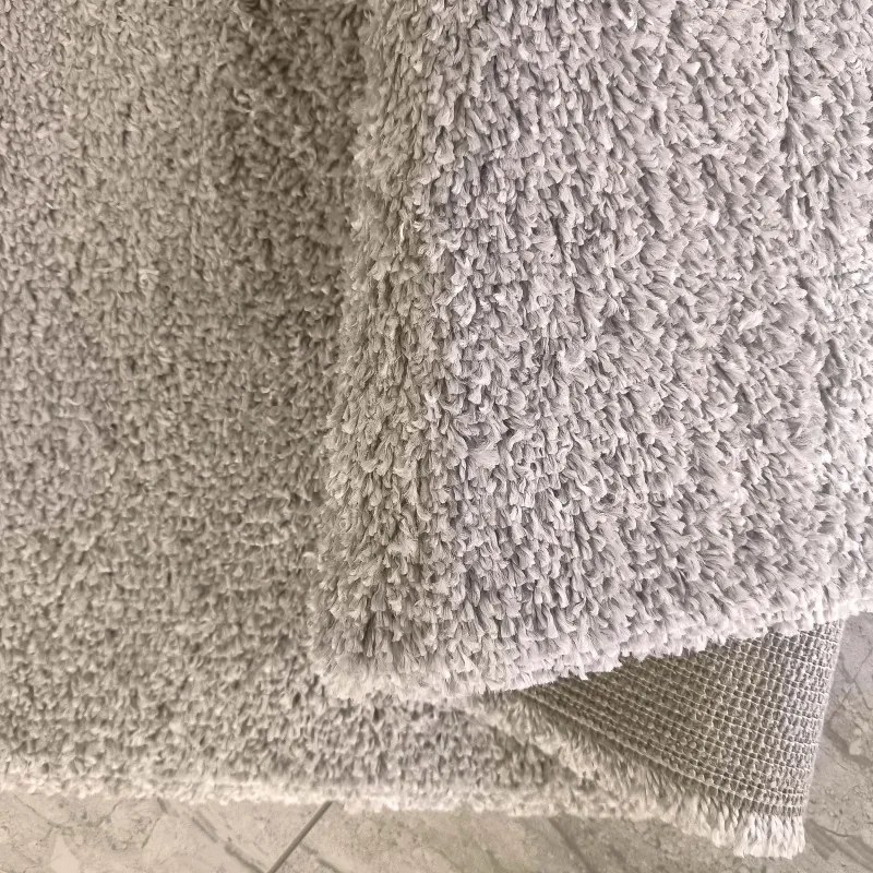 Moderný shaggy koberec v béžovej farbe Šírka: 80 cm | Dĺžka: 150 cm