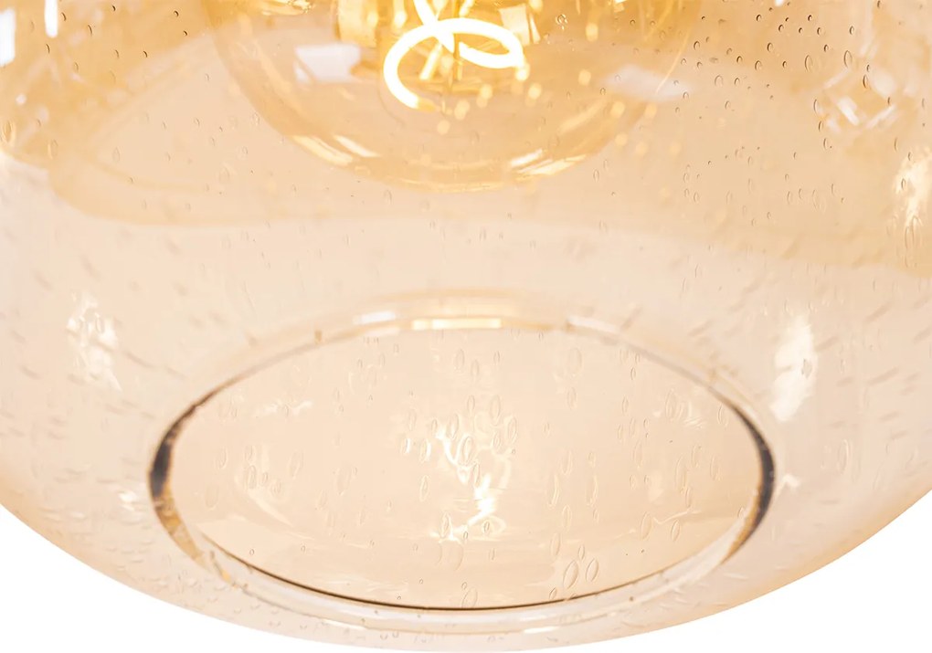 Dizajnové závesné svietidlo čierne s mosadzou a jantárovým sklom 4-svetlo - Zuzanna