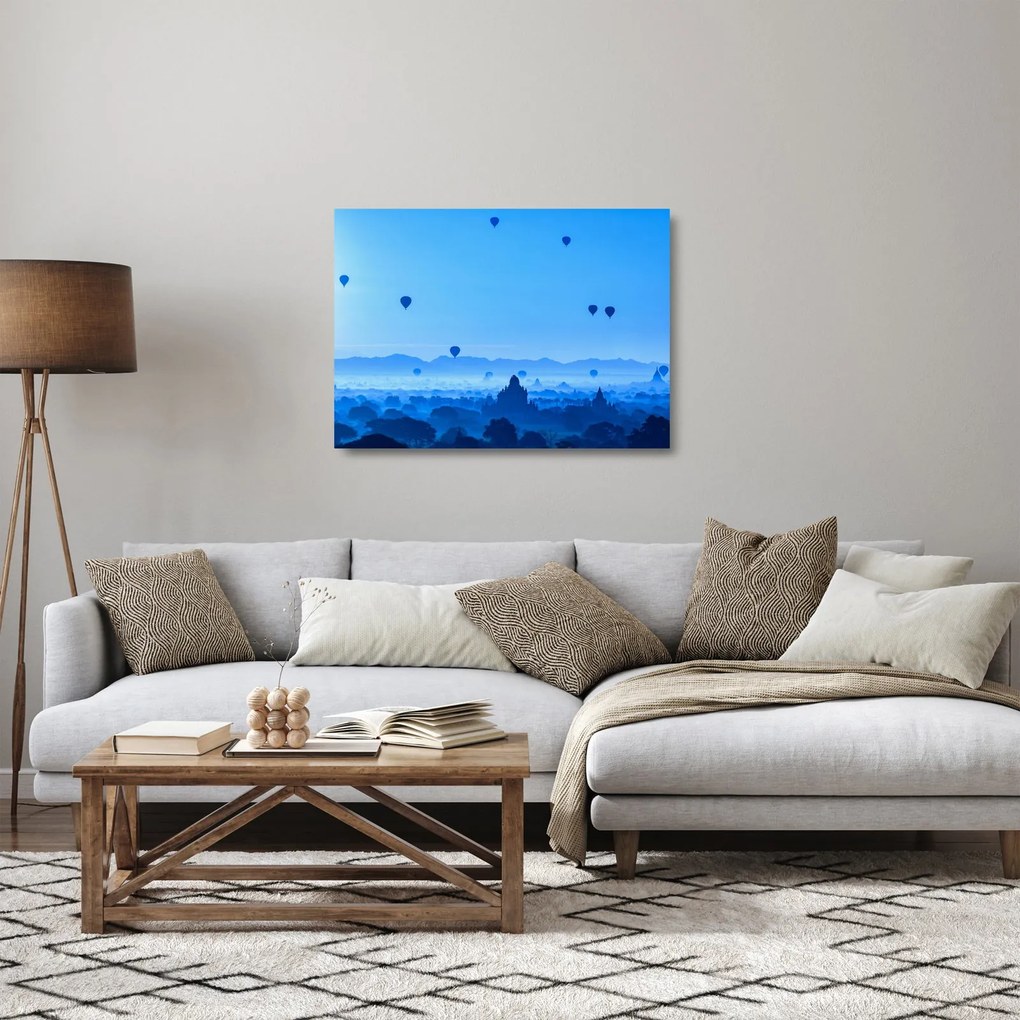 Sklenený obraz - Balóny nad krajinou (70x50 cm)