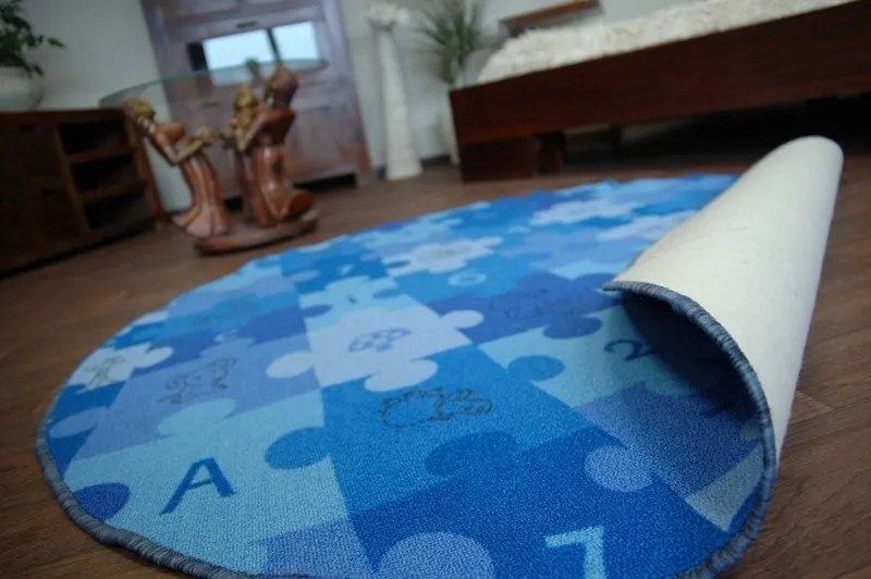 Detský guľatý koberec PUZZLE modrý