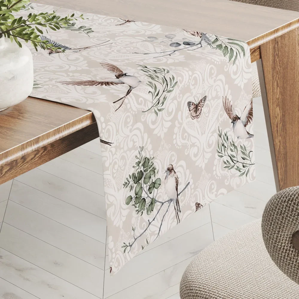 Biante Bavlnený behúň na stôl Sandra SA-490 Lastovičky s motýlikmi na béžovom ornamente 20x120 cm