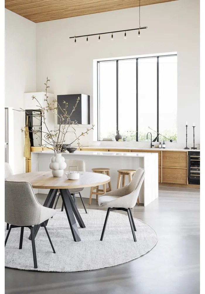 Okrúhly rozkladací jedálenský stôl v dekore duba v prírodnej farbe ø 135 cm Maddock – Rowico