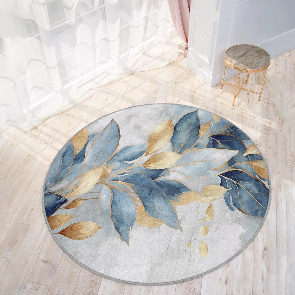 Prateľný okrúhly koberec v modrej a zlatej farbe ø 80 cm Golden Leaves – Mila Home