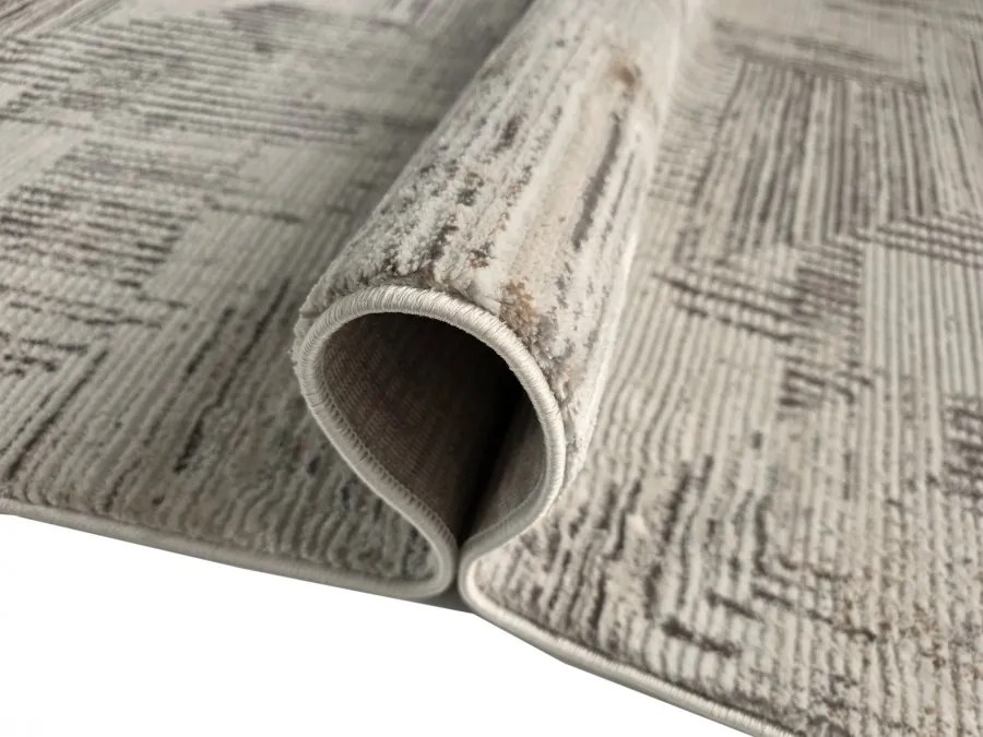 DC Koberec Oman 632 tmavá vizion zlatá Rozmer: 120×170 cm