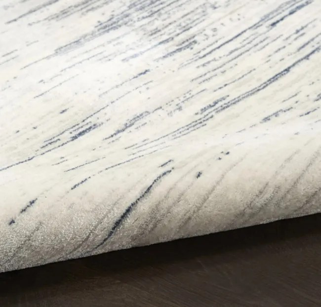 Koberec DKNY Grand Street slonia kosť / modrý