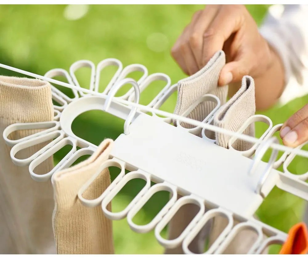 Béžový závesný sušiak na bielizeň Petal – Joseph Joseph