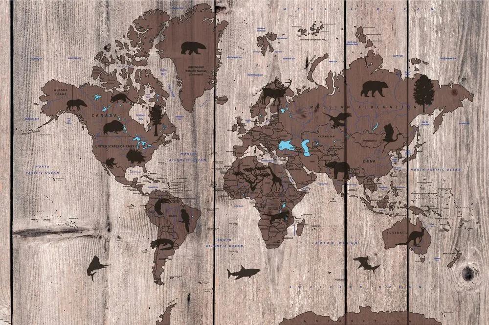 Tapeta mapa sveta so symbolickými zvieratami  na drevenom podklade