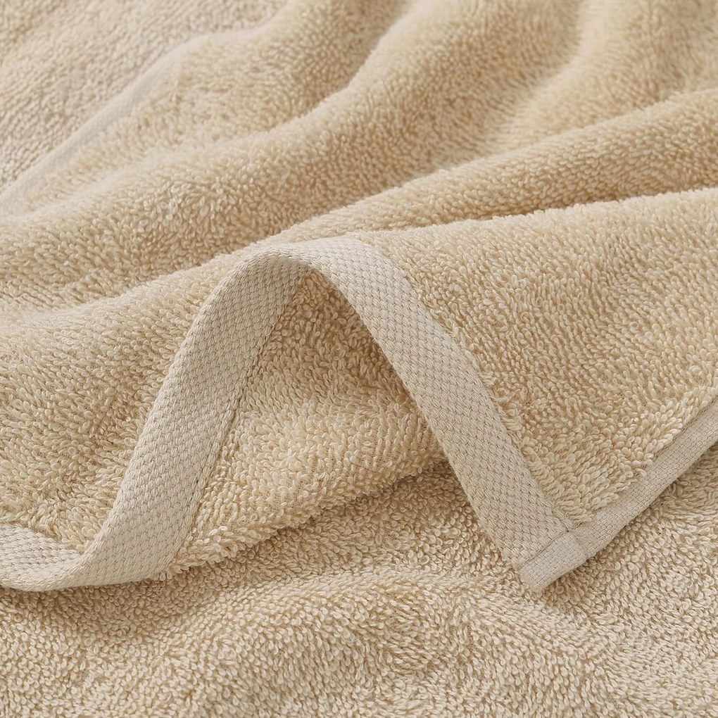 Goldea detský froté uterák - tučniak na béžovej 30 x 50 cm