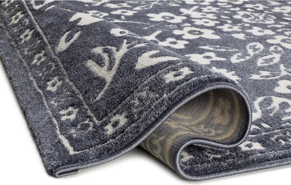 Tmavomodrý koberec 133x190 cm Amara – Universal