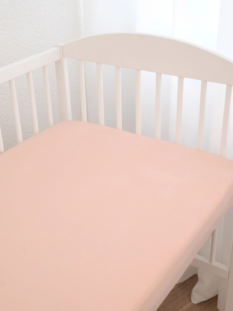 Jersey prostěradlo do postýlky s elastanem 70 × 140 cm – lososové