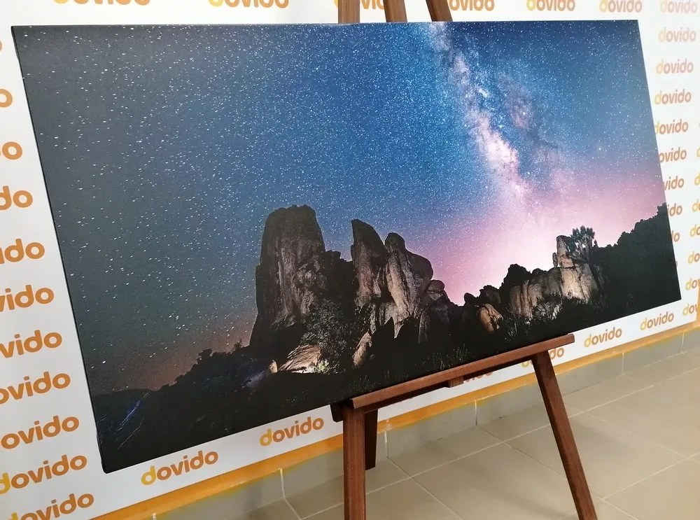 Obraz hviezdna obloha nad skalami - 100x50