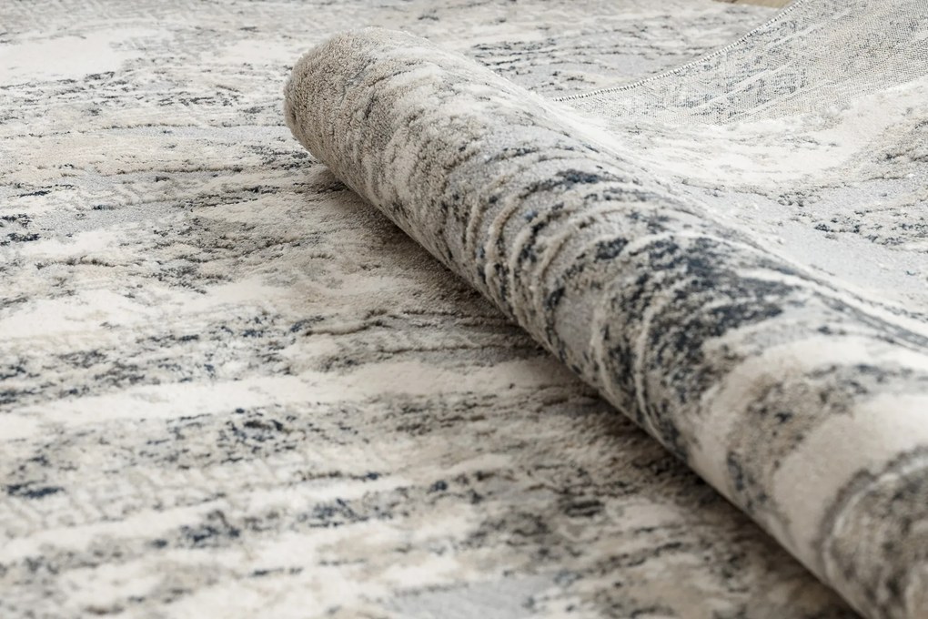 Koberec TULS 51328 s abstraktným vzorom, slonovinová sivá