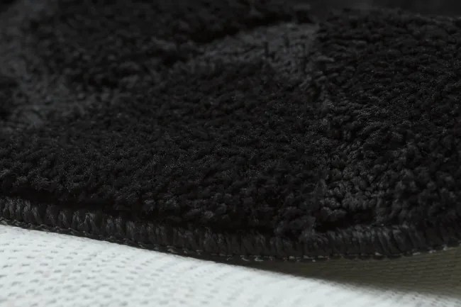 Kúpeľňový koberček SUPREME STONES kamienky, čierny kruh