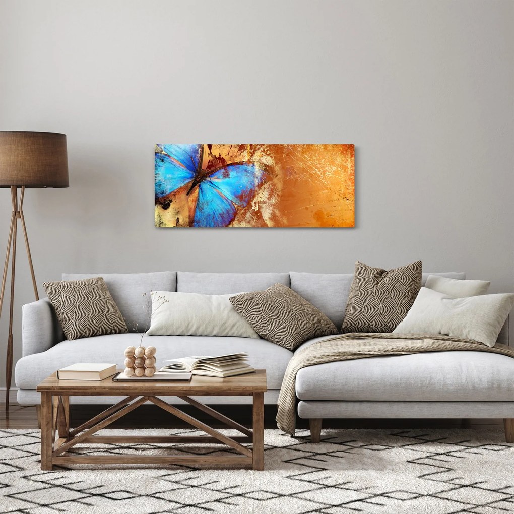 Obraz - Modrý motýľ (120x50 cm)
