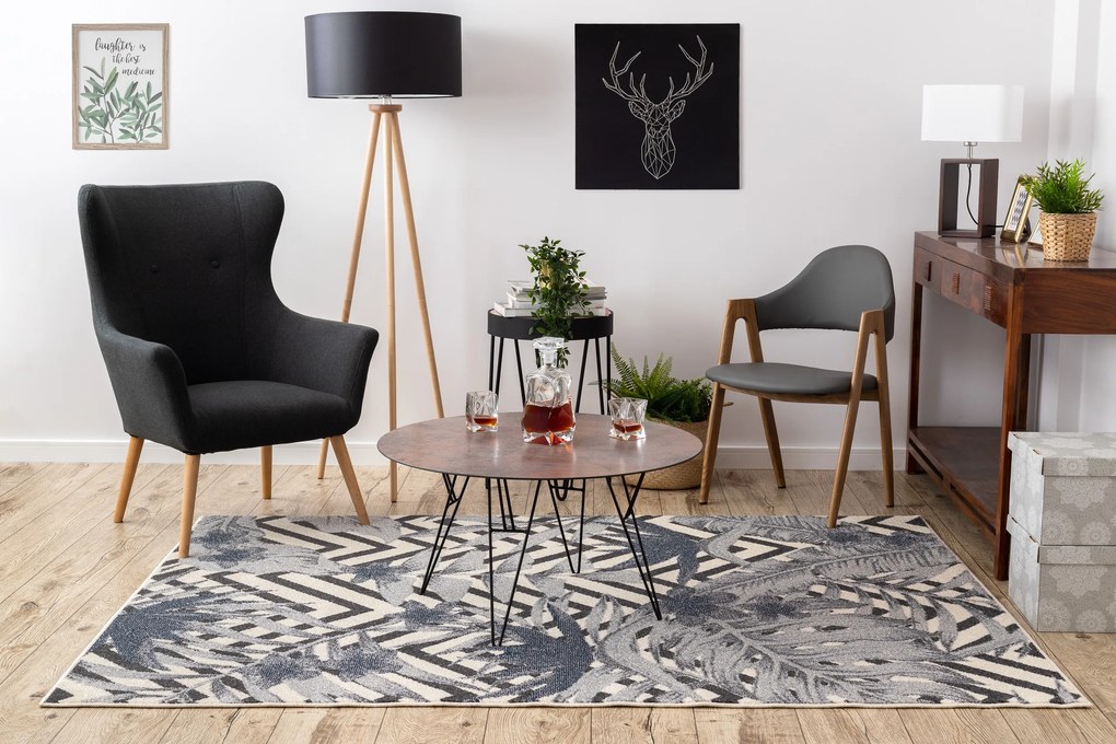 Koberec HEOS 78540 krémovo / modrý LISTY DŽUNGLE