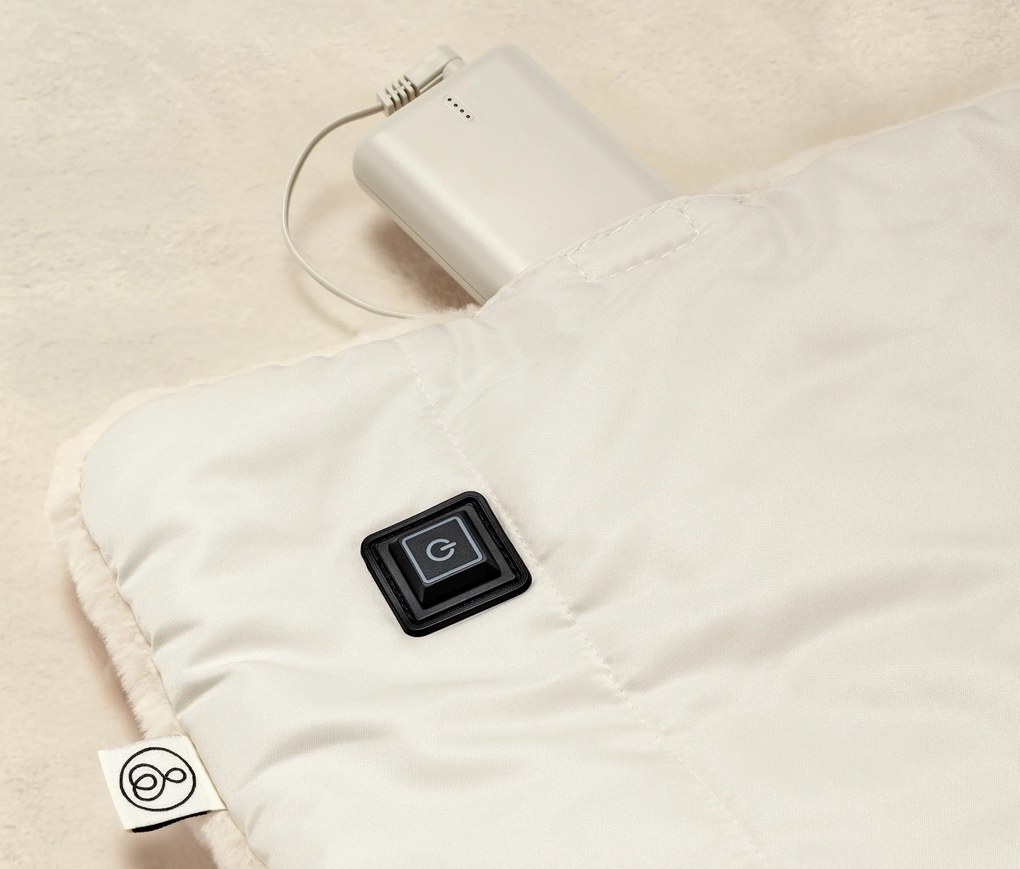 Hrejivé pončo s akumulátorom