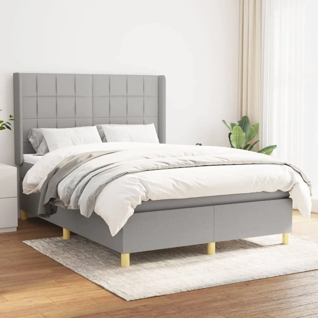 Boxspring posteľ s matracom bledosivý 140x190 cm látka 3131985
