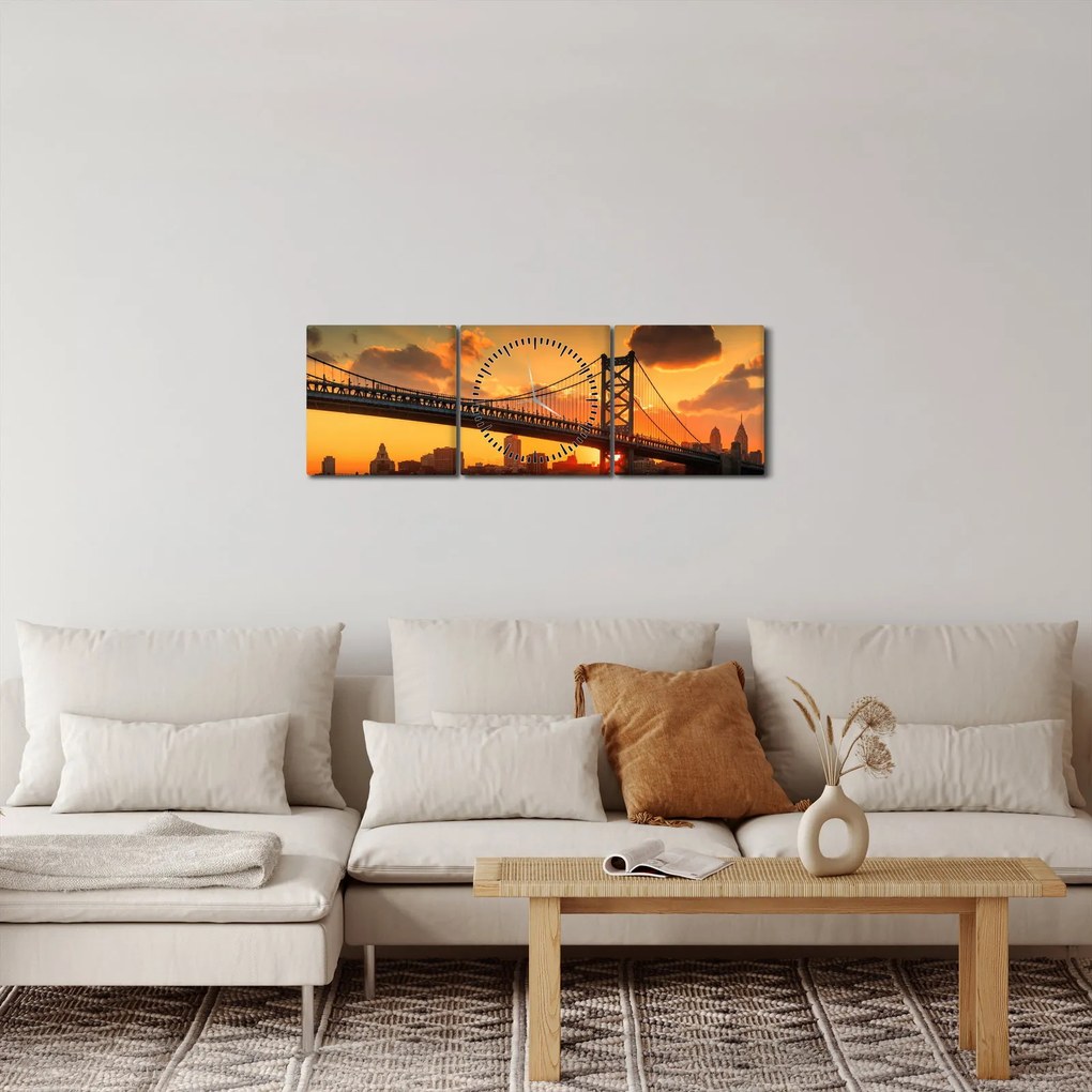 Obraz - Západ slnka nad mostom Bena Franklina, Filadelfia (s hodinami) (90x30 cm)