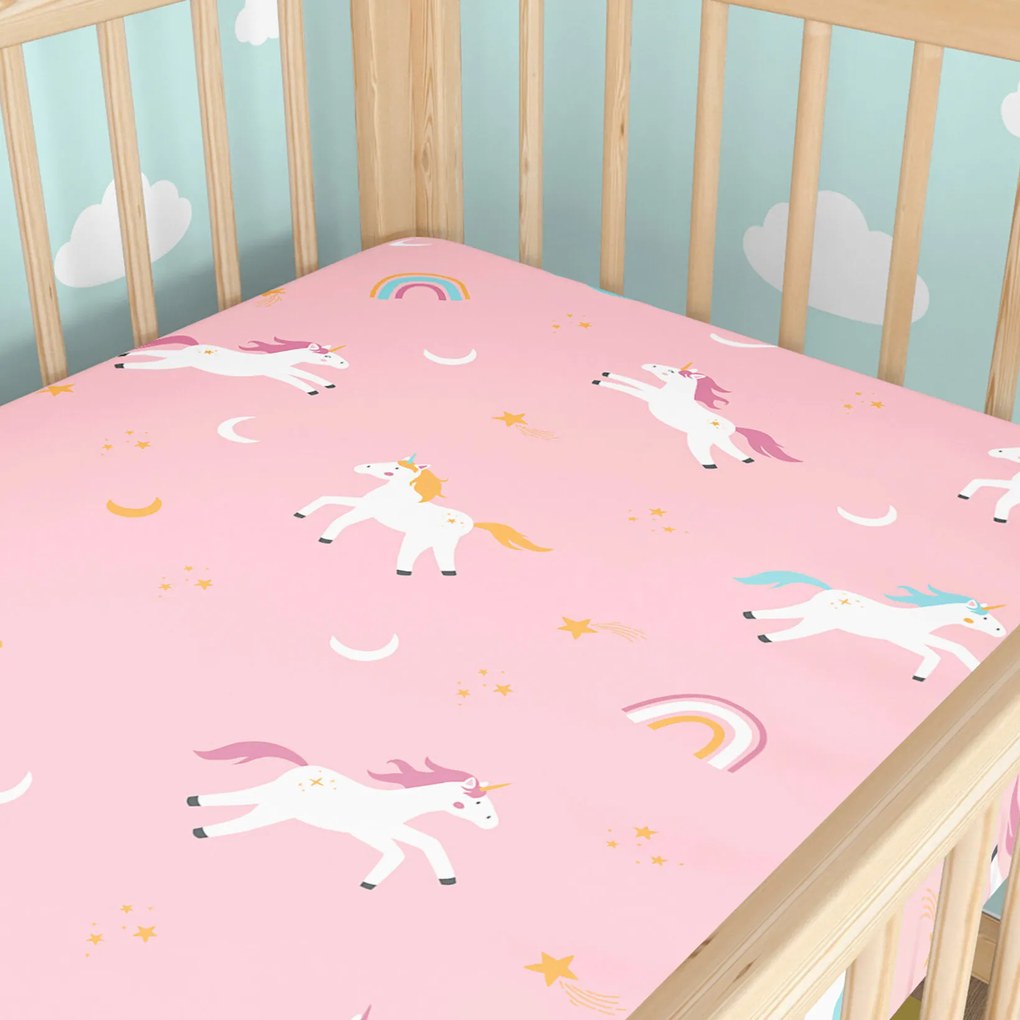 Goldea bavlnená napínacia plachta do detskej postieľky - veselí jednorožci 60 x 120 cm