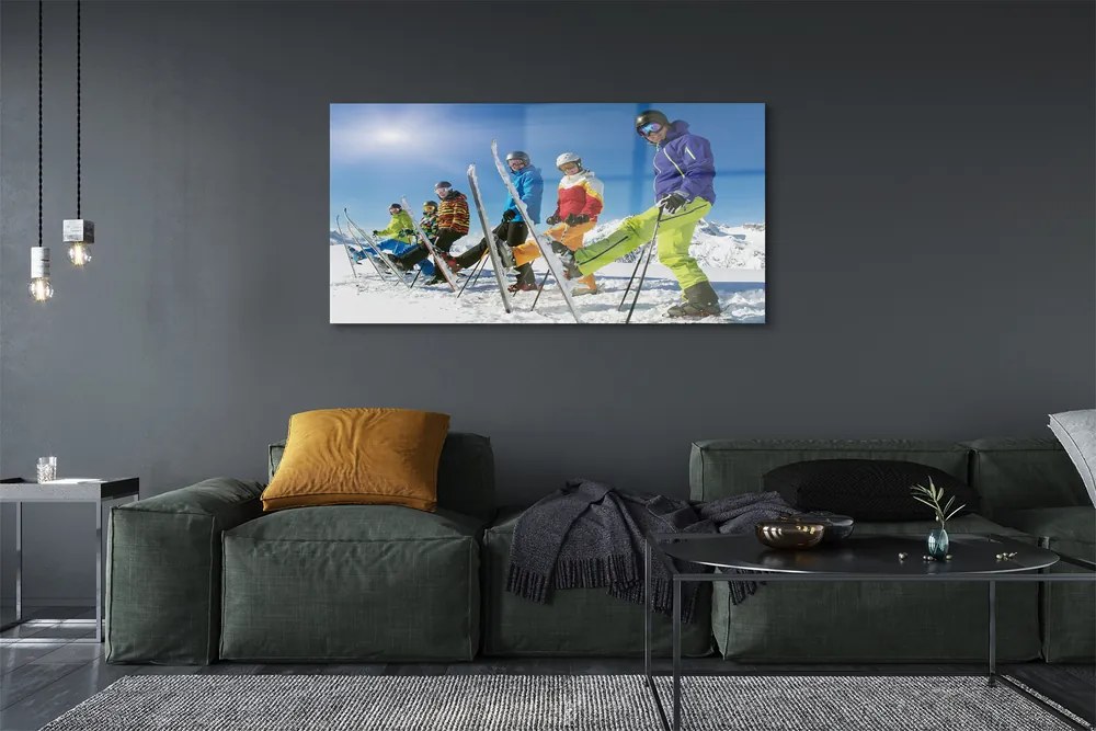 Obraz plexi Lyžiari zimné hory 140x70 cm