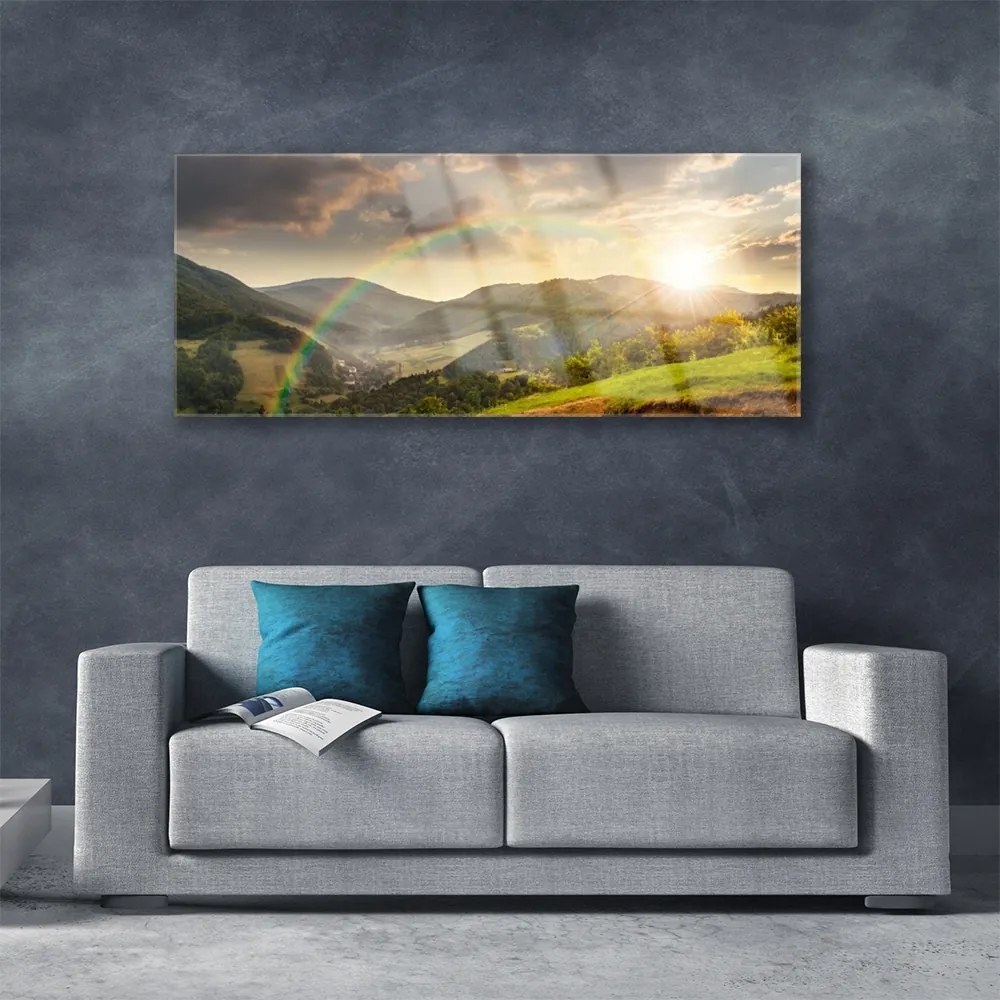 Obraz plexi Lúka hory západ slnka 125x50 cm
