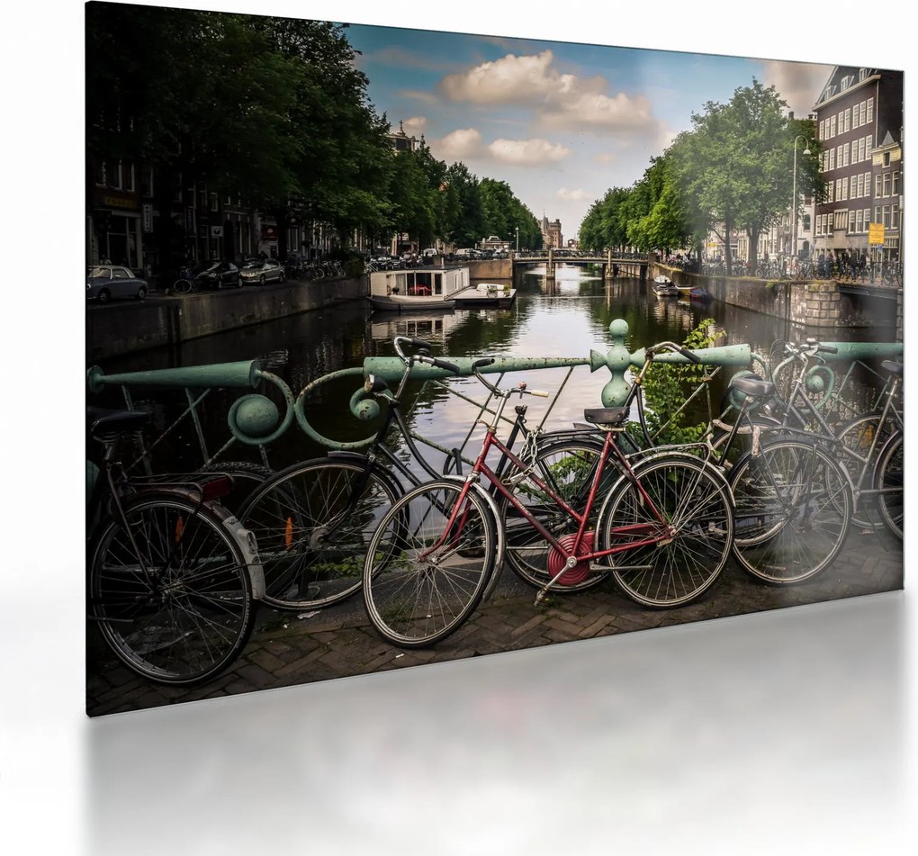 Sklenený obraz bicykla v meste (70x50 cm)