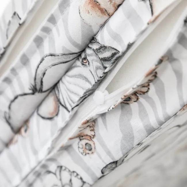 Cestovná postieľka DREAMER zebra / lev / slon