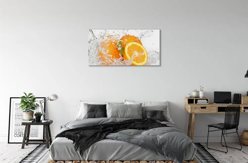 Obraz canvas Pomaranče vo vode 125x50 cm