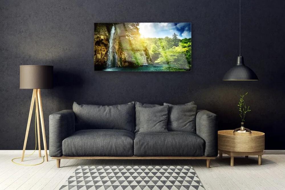 Obraz na skle Vodopád stromy príroda 140x70 cm