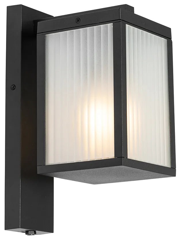 Vonkajšia nástenná lampa čierna s rebrovaným sklom a senzorom súmraku - Charlois