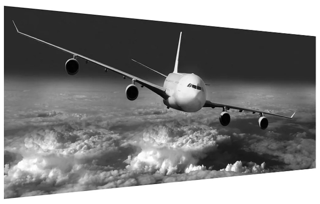 Čiernobiely obraz lietadla v oblakoch (120x50 cm)