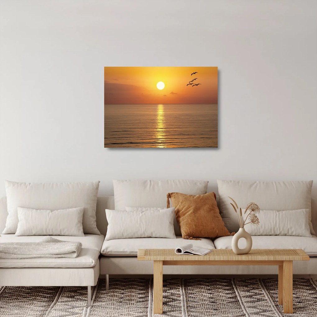 Sklenený obraz - Západ slnka nad oceánom (70x50 cm)