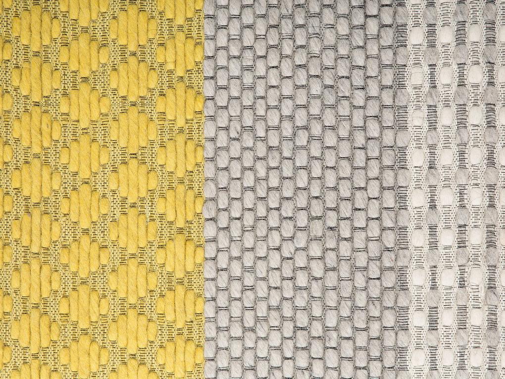 Vlnený koberec 140 x 200 cm žltá/sivá AKKAYA Beliani