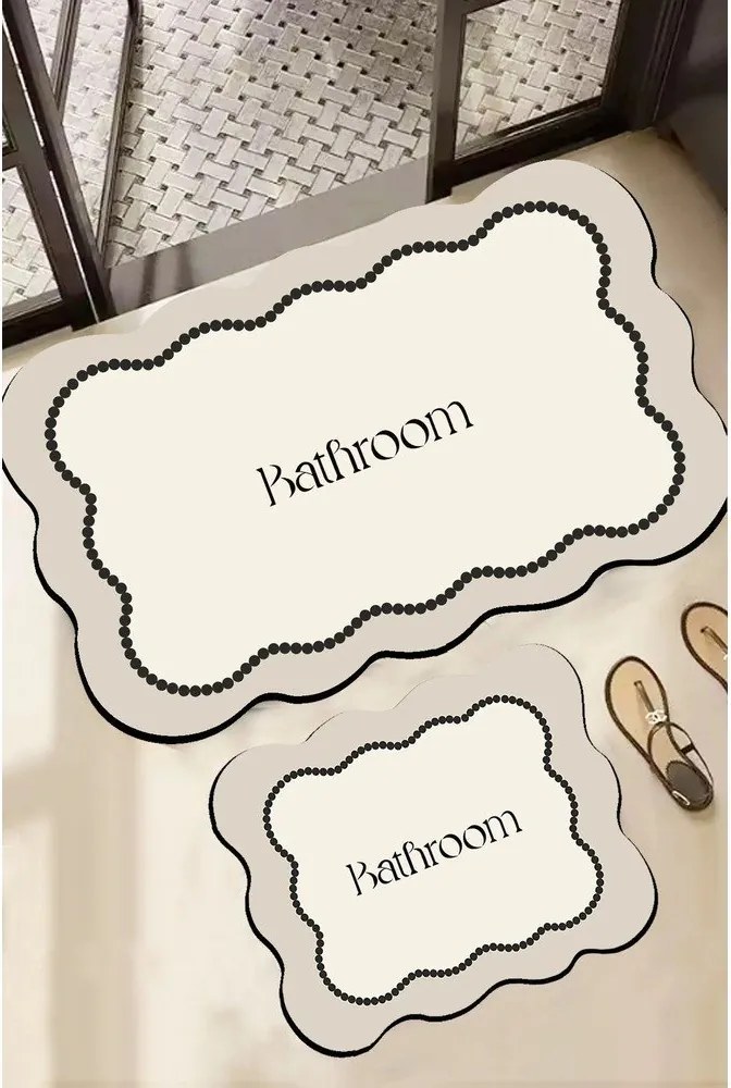 Krémové kúpeľňové predložky v súprave 2 ks 60x100 cm Bounde – Foutastic